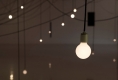 lightbulbs hanging from wire 