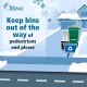 Keep bins out of the way of pedestrians and plows