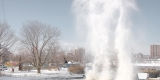 image of snow and ice cloud created by blasting ice on the river