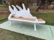stylistic bench with wooden seat and an antler shaped back