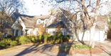 Heritage house surrounded by trees at 6 Coltrin Place.