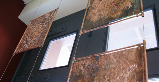 A close-up image of 3 of the copper panels.