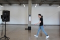 person walking through the gallery