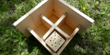 Place a wooden block in each compartment of the box