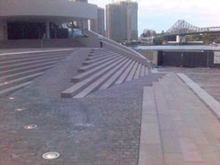  This ramp at the Museum of Civilization is artistically integrated with stairs and provides a levelled area at the top.