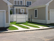 Photo 25 - An example of a “green” driveway; grass replaces most of the concrete parking pad