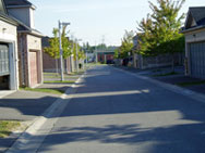 Photo 26 - An example of a rear laneway that provides access to garages