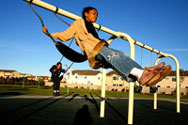 Photo 38 - Children enjoying the swings in their neighbourhood park