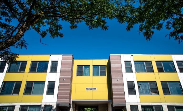 A modern 3 story apartment building 