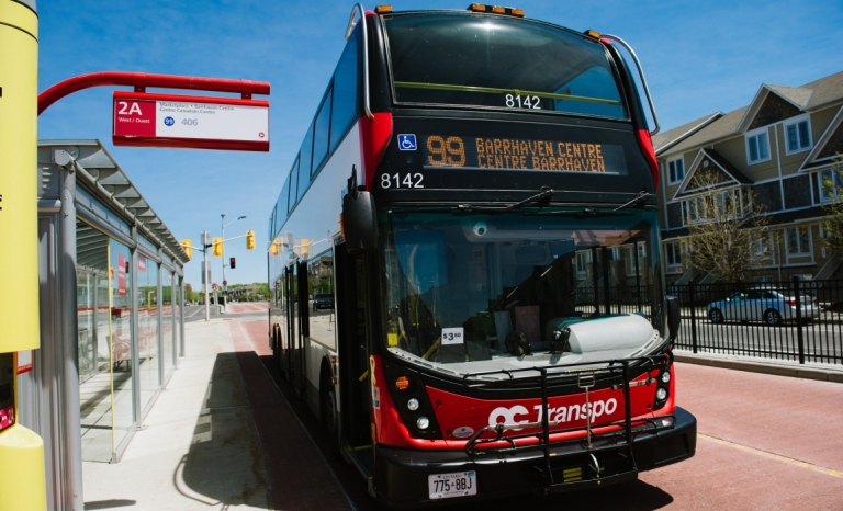 A double decker OC Transpo bus in a rapid transit lane in Barrhaven