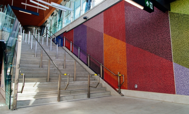 Public art tile wall mosaic at Tunney's Pasture Station