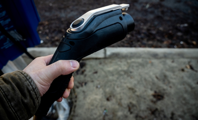 Close-up of an electric vehicle charging device