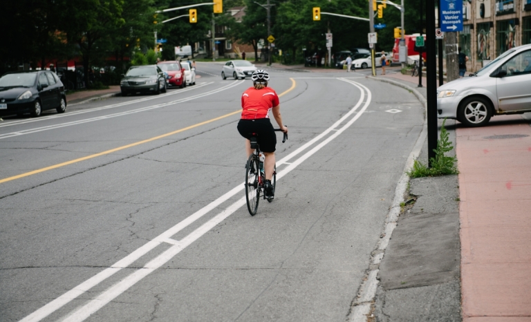 A cyclist in a bike lane