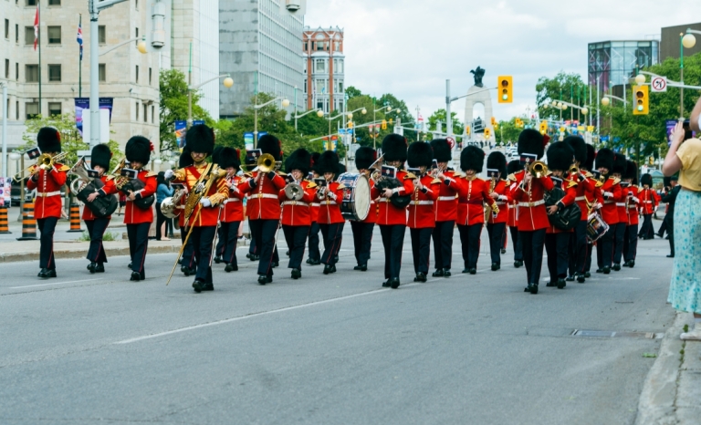 A column of Governor General foot soldiers marching down Elgin Street