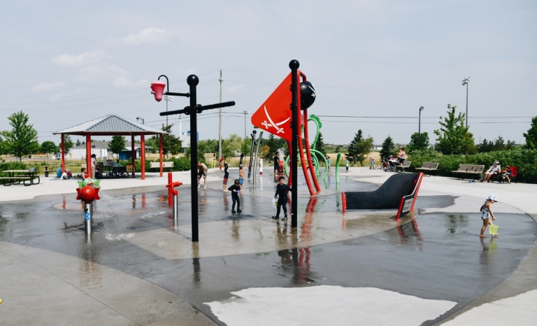 A pirate themed splash pad with kids playing