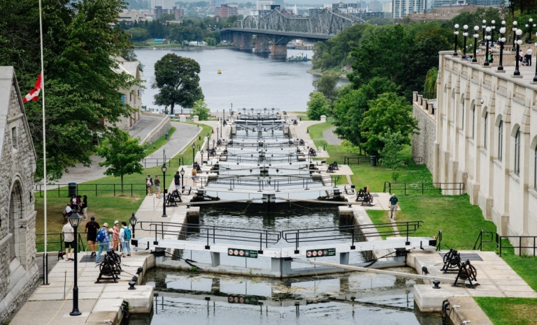 The last few locks of the Rideau Canal as it connects to the Ottawa River with Alexandria Bridge in the background