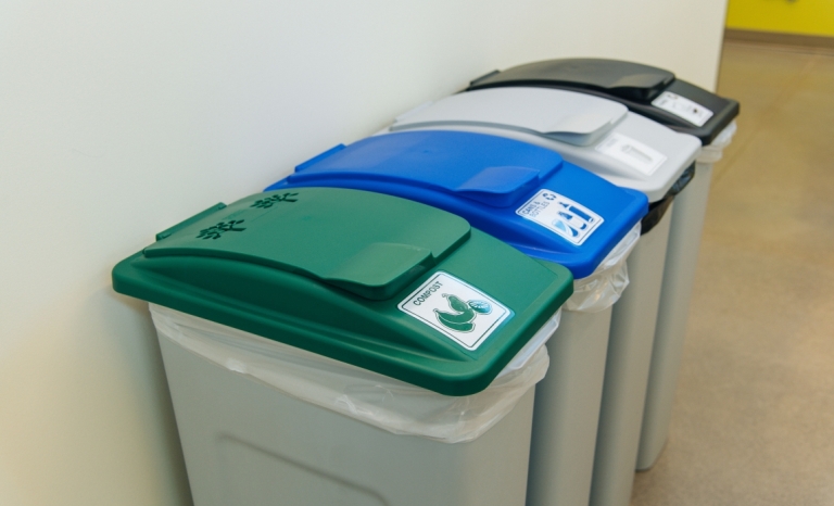 Compost and recycle bins in an office setting