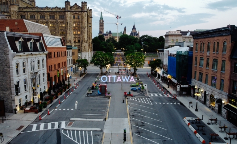 Large multi-coloured letters that says "OTTAWA" on York Street in the Byward Market