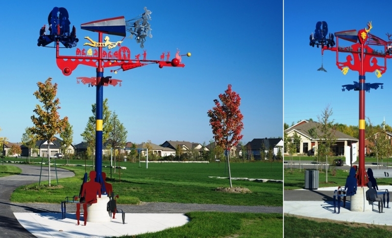 Daytime image of the steel sculptures installed at a park.