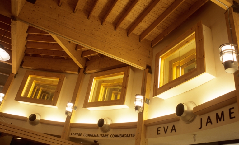 Framed mirrors create the illusion of depth around the upper walls of the rotunda.