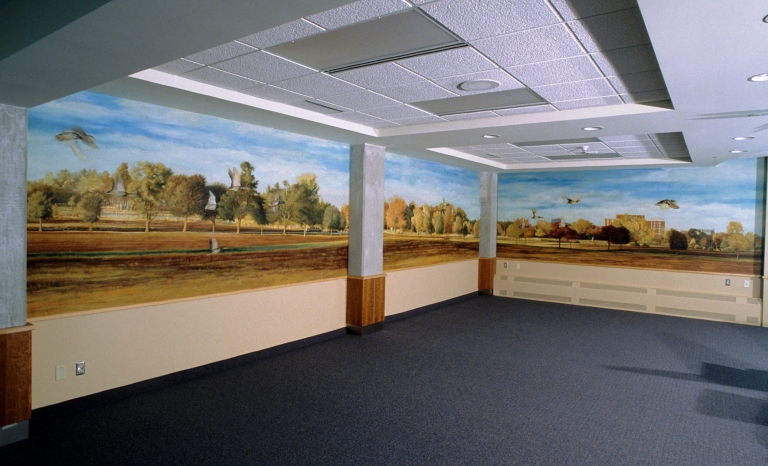 A painted Ottawa landscape expands across two walls. 