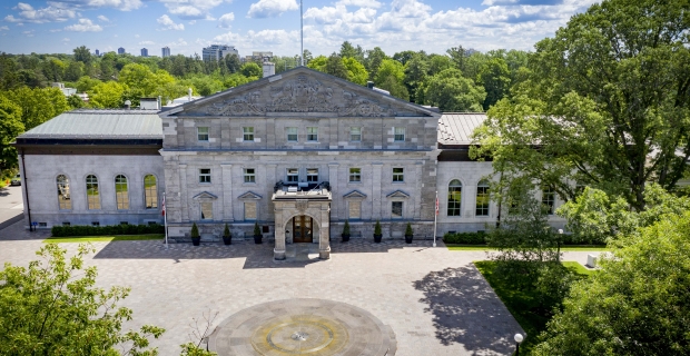 Exterior aerial view of facade, the residence and workplace of the governor general of Canada, taken during summer.  