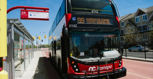 A double decker OC Transpo bus in a rapid transit lane in Barrhaven