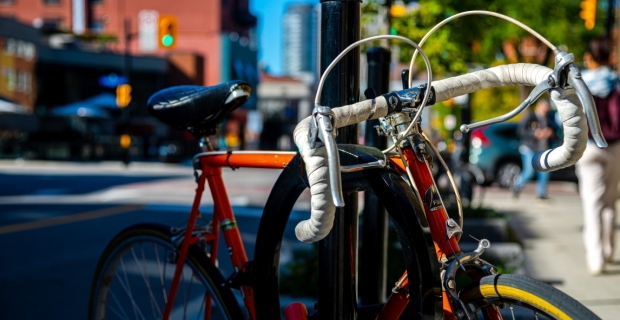 A big locked up at a street side bike stand