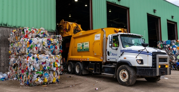 A City owned recycling truck uloading at Cascades Recycling Facility