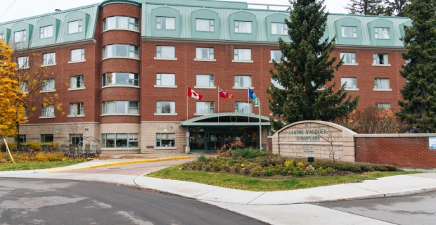 Front entrance and sign of 5 story long term care facility