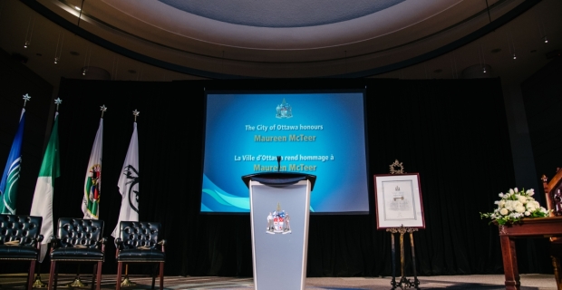 The center of City of Ottawa Council Chambers with the awards ceremony set up for a Key to the City event for Maureen McTeer.