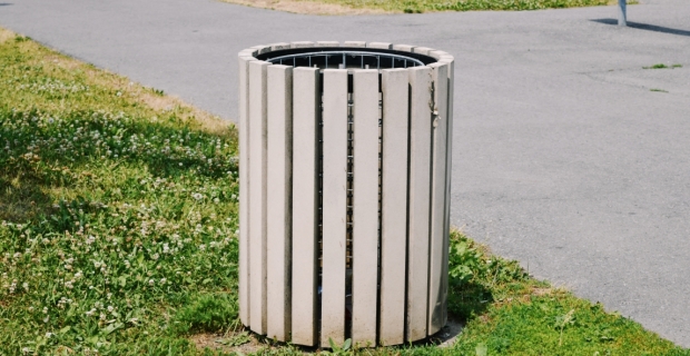 A waste bin in a city park