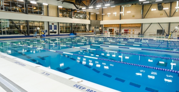 A large indoor pool facility with lane markers