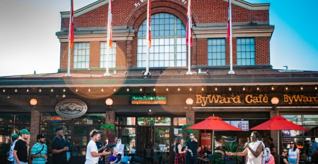 A summer afternoon with music to entertain the visitors in front of the  ByWard Market Building main entrance. 