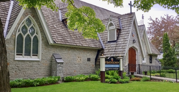 Exterior front of St. Bartholomew's Anglican Church, built in 1867 of local limestone in Gothic Revival style.  