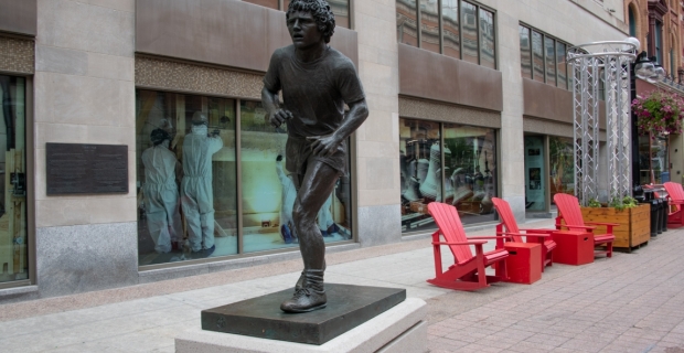 bronze sculpture of Terry Fox in running motion 