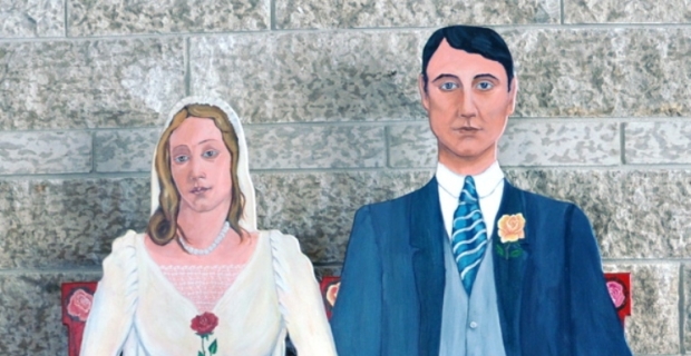 Bench with expressionless bride and groom cutout.