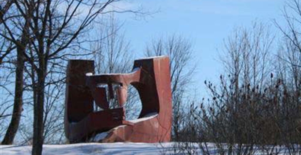 Daytime, winter image of the installed steel sculpture.