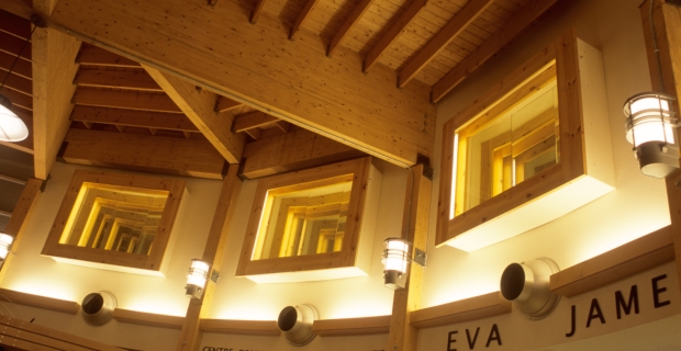 Framed mirrors create the illusion of depth around the upper walls of the rotunda.