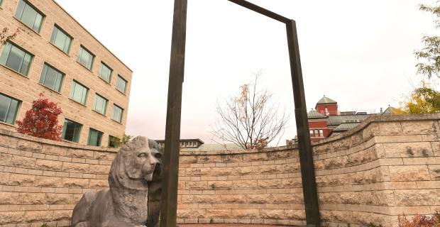 An image of the lion and the frame in the East Courtyard of City Hall.