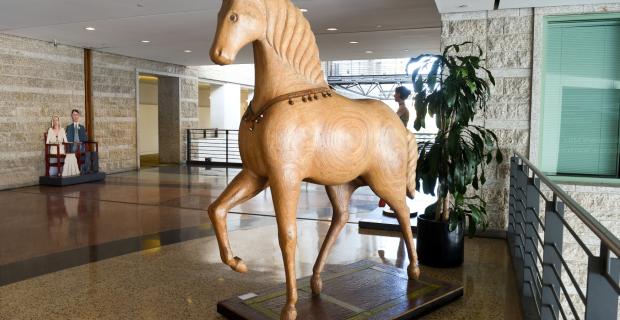 A lifesized stylized sculpture of a horse.
