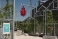 The bright red beacon illuminates Winston Square and features silhouettes of flora and fauna identified with the Westboro area, including the Spotted Turtle and Small Mouth Bass.