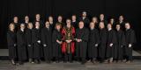 Family photo of 2018 City Council members in black robes