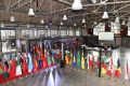 Reception hall with Diplomatic Corps flags on red carpet