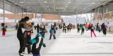 daytime image of a group of people skating at Jim Tubman Chevrolet Rink