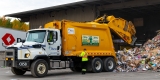 A City of Ottawa recycling truck dumps fiber at the plant.  