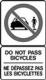 Sign warning motorized vehicles 'do not pass bicycles' in this area