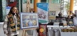 Stand de Black History Ottawa à la Fête du patrimoine, avec Ruth Ayman, agente de projet.