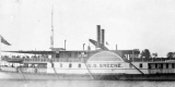 Sidewheel steamer boat travelling on river