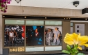 a photo portraying three of the featured exhibition pieces on Sparks Street